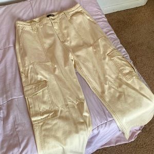 cream cargos, never worn, great condition